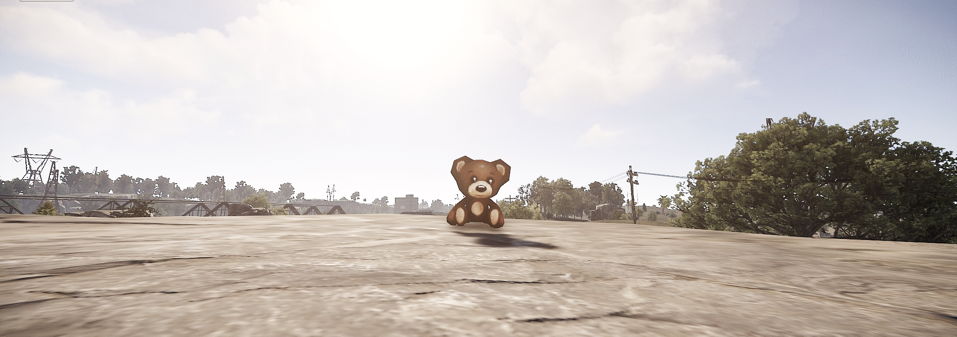 A teddy bear sitting in a Rust environment